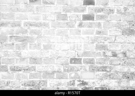 Simple grungy white brick wall surface with excess cement uniting the ...