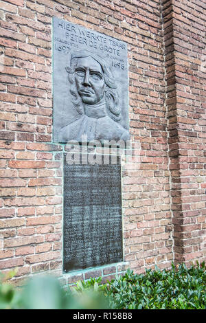 AMSTERDAM, THE NETHERLANDS - September 7, 2018: a memorial plaque on an old warf building where Russian emperor Peter the Great studied shipbilding in Stock Photo