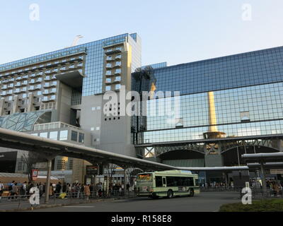 A view of the outside of the busy Kyoto train station; the whole station complex is an impressive piece of modern architecture. Stock Photo