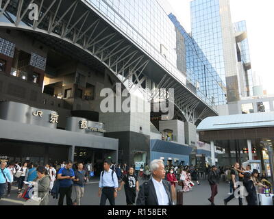 A view of the outside of the busy Kyoto train station; the whole station complex is an impressive piece of modern architecture. Stock Photo