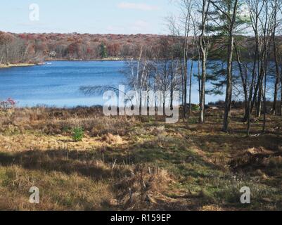 Fawn Lake in the Pennsylvania Pocono Mountains with Autumn colors Stock Photo