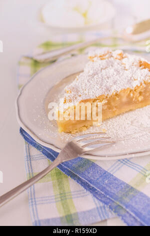 A piece of homemade apple pie lying on a plate Stock Photo