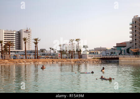 Visitors Bathing in the Dead Sea in Israel Stock Photo