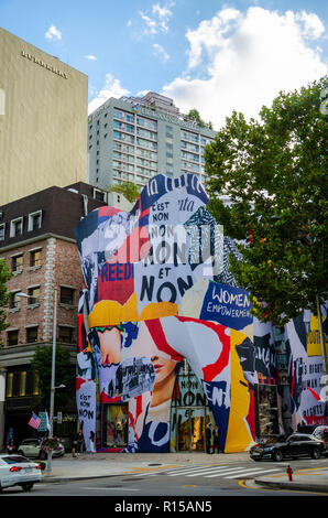 The House of Dior store on Agpujeong-ro in Gangnam, Seoul is an eyecatching focal point with it's external facade decorated with a colourful mural. Stock Photo