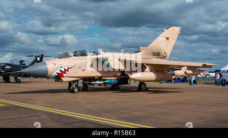 A Royal Air Force Tornado GR4 bomber in desert camouflage and with sharks teeth artwork for the static line up at RIAT, RAF Fairford, UK on 14/7/17.