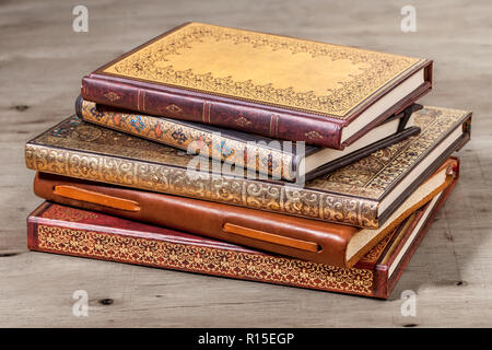 Pile of hard covered old books Stock Photo