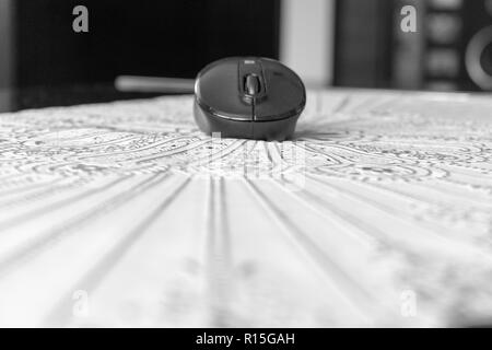 Low angle view of a black bluetooth computer mouse Stock Photo