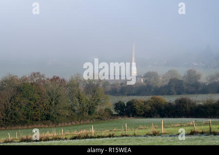 Early morning fog over Bliss Tweed Mill in autumn. Chipping Norton, Cotswolds, Oxfordshire, England Stock Photo