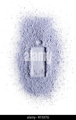Imprint of perfume bottle on violet face powder. Isolated on a white background. Stock Photo