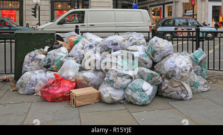 London, United Kingdom - June 22, 2012: Big Pile of Clear Trash Bags at Regent Street in London, UK. Stock Photo