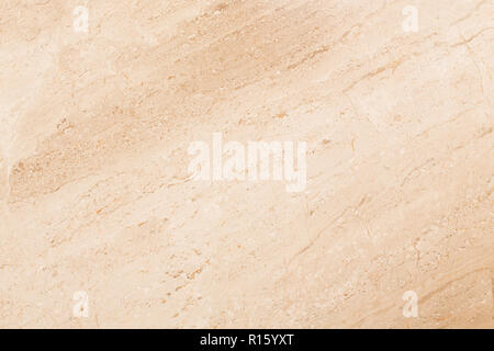 Light beige marble patterned texture background. Natural light beige stone close up. Stock Photo