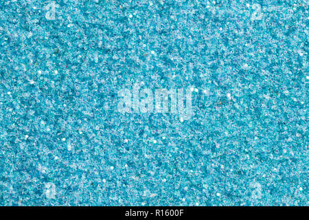 Blue glitter texture Christmas abstract background. Gentle light blue texture with shine. Stock Photo