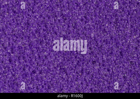 Dark violet foam, EVA texture with contrast porous surface. Stock Photo
