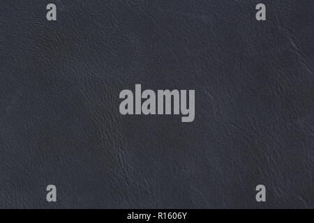 Natural dark blue leather texture. Natural old blue leather on macro. Stock Photo
