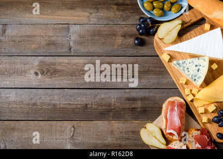 Bread, meat, cheese and fruits Stock Photo