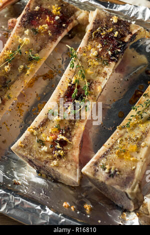 Homemade Roasted Beef Bone Marrow with Thyme and Lemon Stock Photo