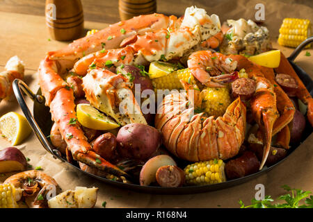 Homemade Cajun Seafood Boil with Lobster Crab and Shrimp Stock Photo