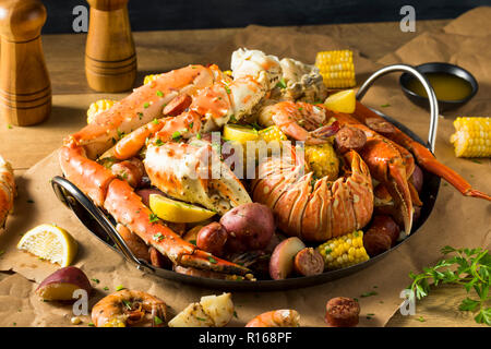 Homemade Cajun Seafood Boil with Lobster Crab and Shrimp Stock Photo