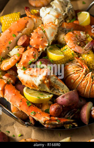 Homemade Cajun Seafood Boil with Lobster Crab and Shrimp Stock Photo