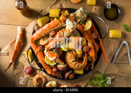 Homemade Cajun Seafood Boil with Lobster Crab and Shrimp Stock Photo