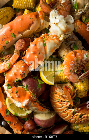 Homemade Cajun Seafood Boil with Lobster Crab and Shrimp Stock Photo