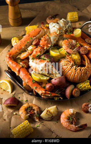 Homemade Cajun Seafood Boil with Lobster Crab and Shrimp Stock Photo