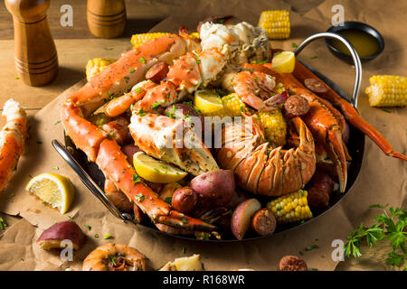 Homemade Cajun Seafood Boil with Lobster Crab and Shrimp Stock Photo