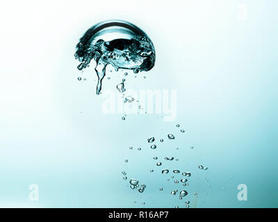 Contorting air bubbles in clear transparent liquid, detail Stock Photo