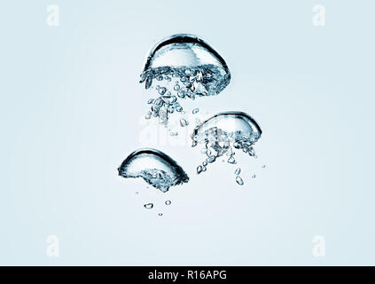 Contorting air bubbles in clear transparent liquid, detail Stock Photo