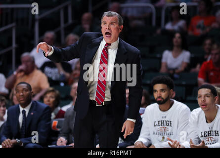 Coral Gables, Florida, USA. 09th Nov, 2018. Lehigh Mountain Hawks head coach Brett Reed shouts instructions to the team during the NCAA mens basketball game between Lehigh Mountain Hawks and University of Miami Hurricanes at the Watsco Center in Coral Gables, Florida. The Hurricanes won 83-62. Mario Houben/CSM/Alamy Live News Stock Photo