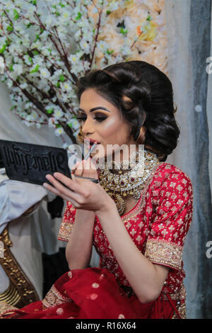 London 10 November 2018  Two of the models at the The National Asian Wedding Show London Olympia  getting ready for the runway show,@Paul Quezada-Neiman/Alamy Live News Stock Photo