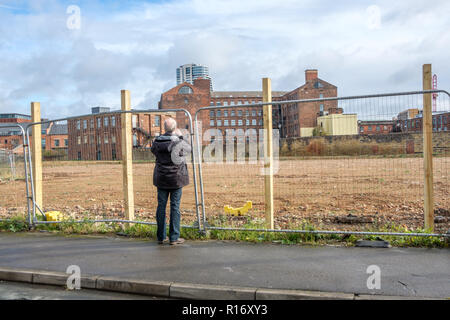 Old factory buildings in the vicinity of Granary Wharf in the city centre of Leeds, which is the largest town in West Yorkshire. Stock Photo