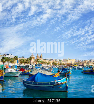 Marxaslokk harbor with traditional maltese eyed boats - luzzu on the ...