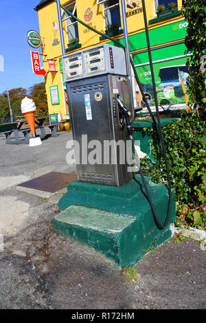 A single petrol pump outside a multi purpose business, Sneem, County Kerry, Ireland - John Gollop Stock Photo