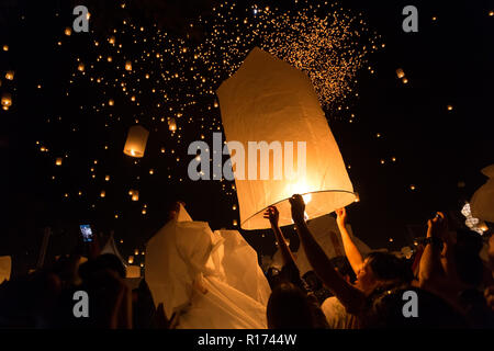 CHIANGMAI THAILAND NOVEMBER 16  : thai people launching sky lantern for Yi Peng buddhist Festival on november 16, 2013 Chiangmai, Thailand Stock Photo