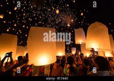 CHIANGMAI THAILAND NOVEMBER 16  : thai people launching sky lantern for Yi Peng buddhist Festival on november 16, 2013 Chiangmai, Thailand Stock Photo