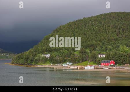 NORRIS POINT, NEWFOUNDLAND, CANADA - Waterfront scene with boats and buildings. Stock Photo