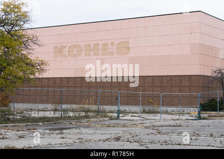The faded outline of a logo sign outside of a closed Kohl's retail store in Waterford Township, Michigan on October 26, 2018. Stock Photo