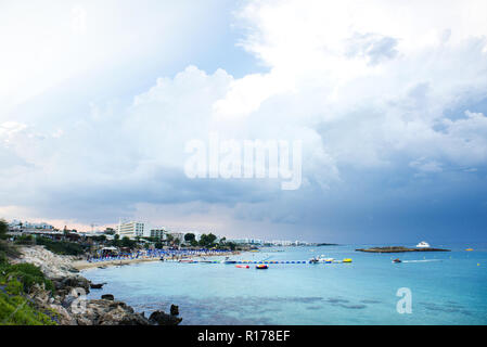 Protaras Cyprus Fig Tree Bay Beach. Cloudy Storm Sky. Mediterranean Sea. Stock Photo