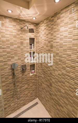 Modern shower and taps in bathroom Stock Photo