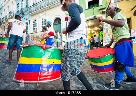 SALVADOR, BRAZIL - CIRCA FEBRUARY, 2018: A troupe of young Brazilian drummers pass through the historic neighborhood of Pelourinho Stock Photo