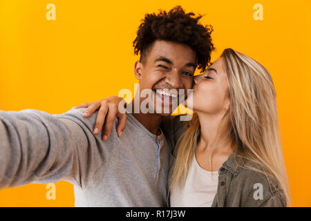 Premium Photo | Cute couple looking at their selfie