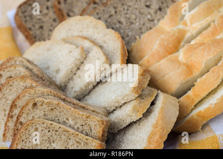 sliced bread on table selection macro Stock Photo