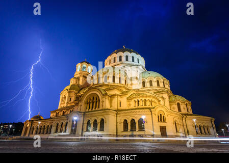 Alexander Nevsky cathedral in Sofa, Bulgaria - amazing orthodox church, a city landmark - beautiful night shot, lightning strikes over the dome Stock Photo