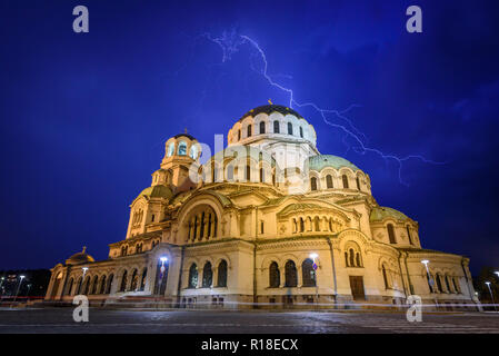 Alexander Nevsky cathedral in Sofa, Bulgaria - amazing orthodox church, a city landmark - beautiful night shot, lightning strikes over the dome Stock Photo