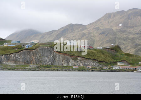 Part of the city of Unalaska, also known as Dutch Harbor, surrounded by mountains and the Bering Sea, Unalaska Island, Aleutian archipelago, Alaska.
