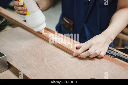 Thai engineer student in carpentry workshop Stock Photo