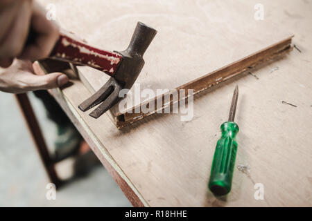 Thai engineer student in carpentry workshop Stock Photo