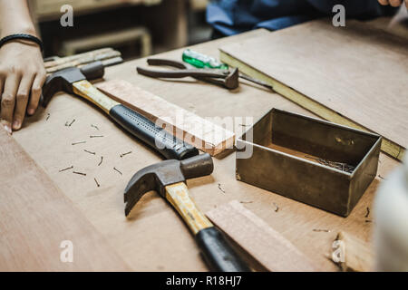 Thai engineer student in carpentry workshop Stock Photo