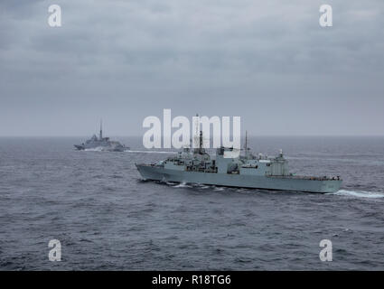 The Canadian frigate HMCS Halifax in company with the French frigate FS Bretagne Stock Photo